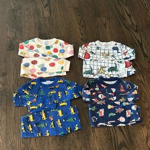 Gently used Hanna Andersson pajamas, size 6-7, 4 pairs